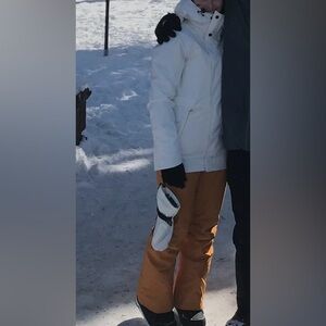 The North Face women’s mustard colored snowboarding pants